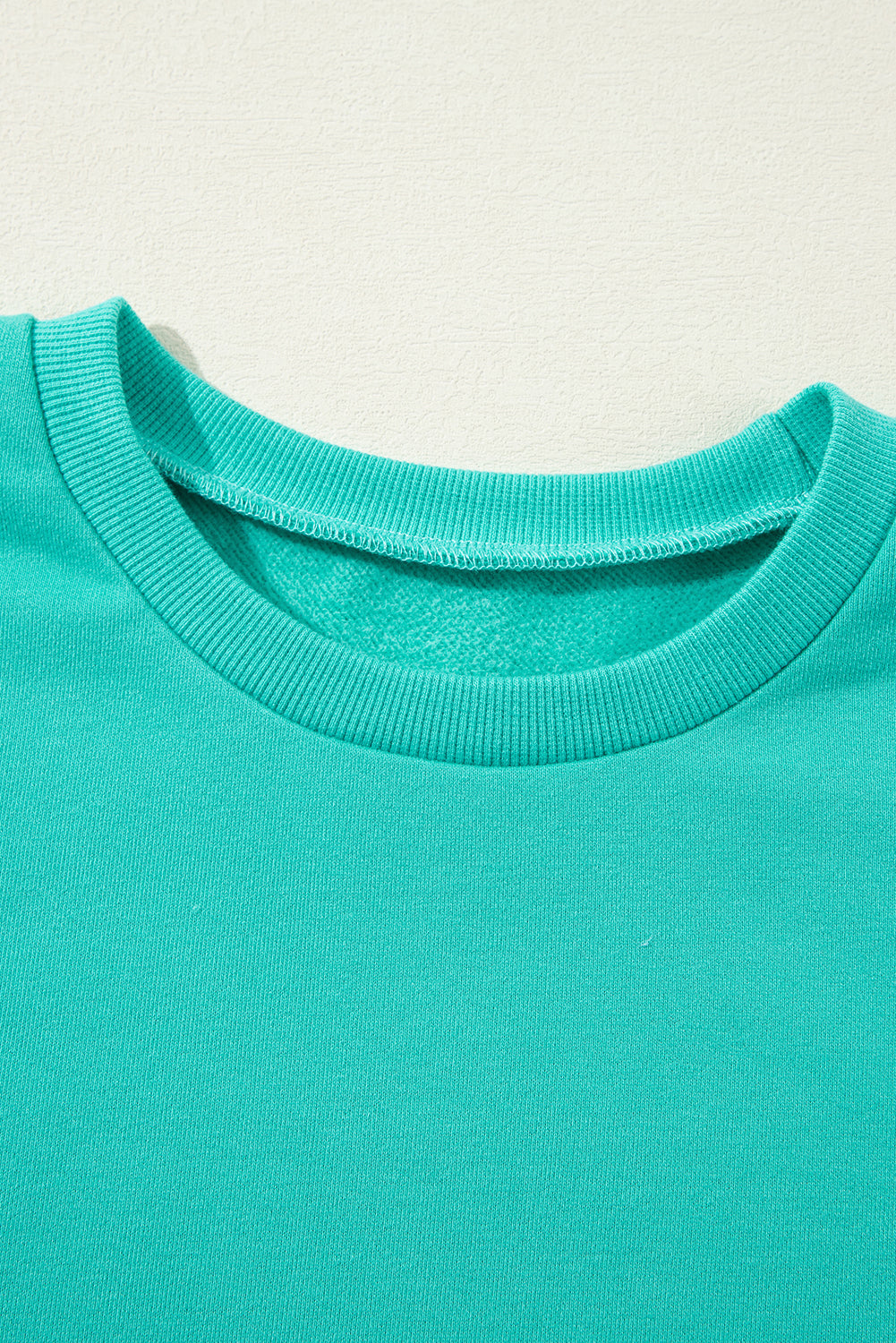 Valerian Solid Fleece Lined Drop Shoulder High Low Sweatshirt