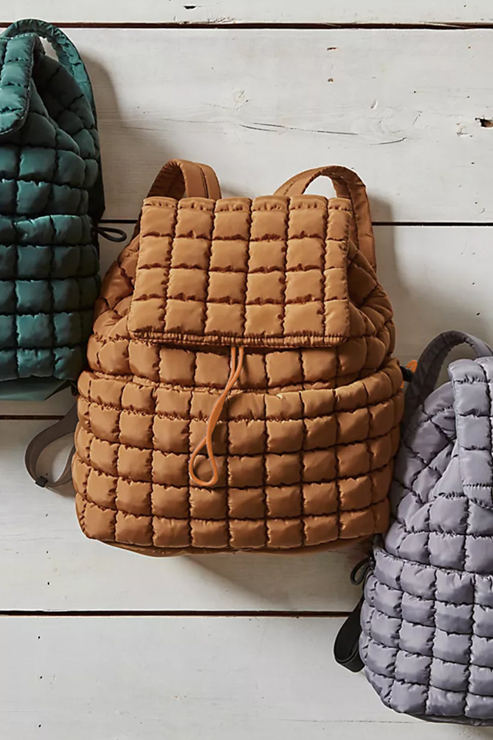 Dusk Blue Solid Flapped Quilted Puffer Backpack