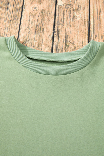 Parchment Solid O Neck High Low Hem Pullover Sweatshirt