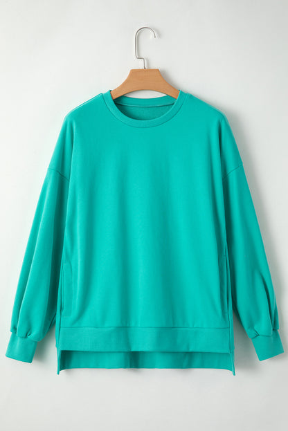Parchment Solid O Neck High Low Hem Pullover Sweatshirt