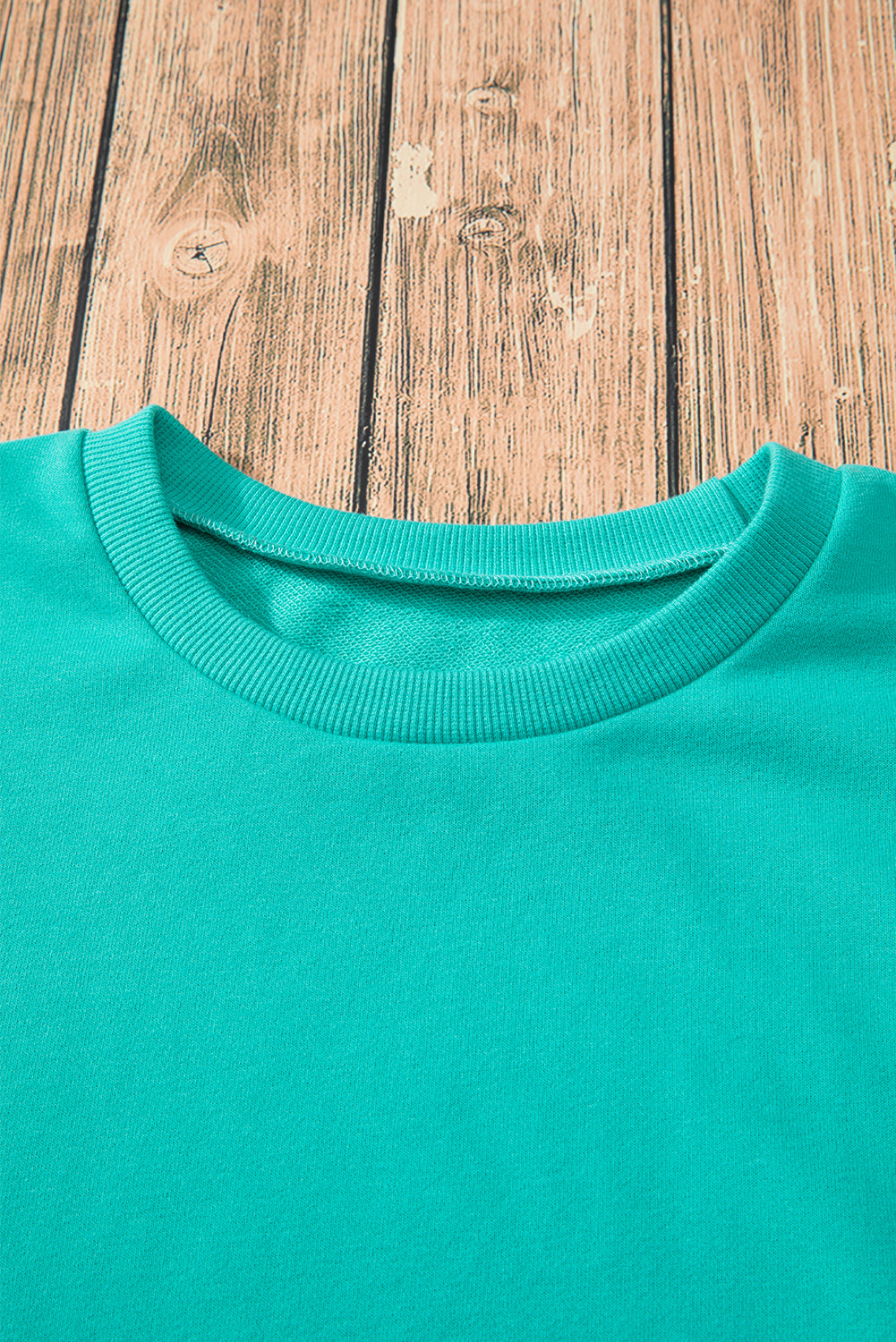 Parchment Solid O Neck High Low Hem Pullover Sweatshirt
