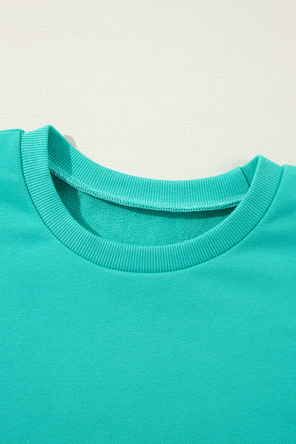 Parchment Solid O Neck High Low Hem Pullover Sweatshirt