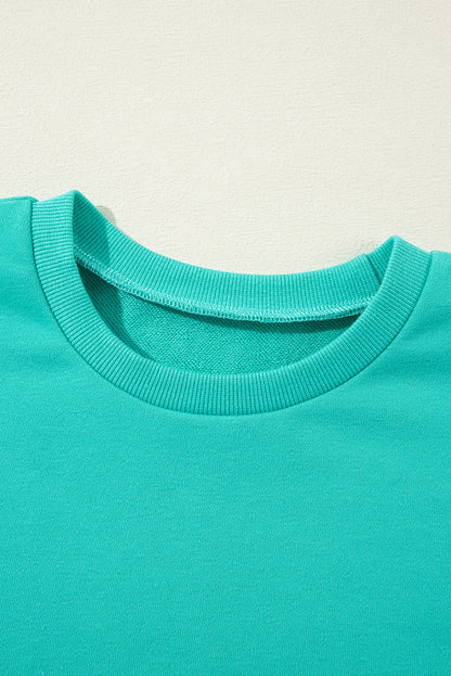 Parchment Solid O Neck High Low Hem Pullover Sweatshirt