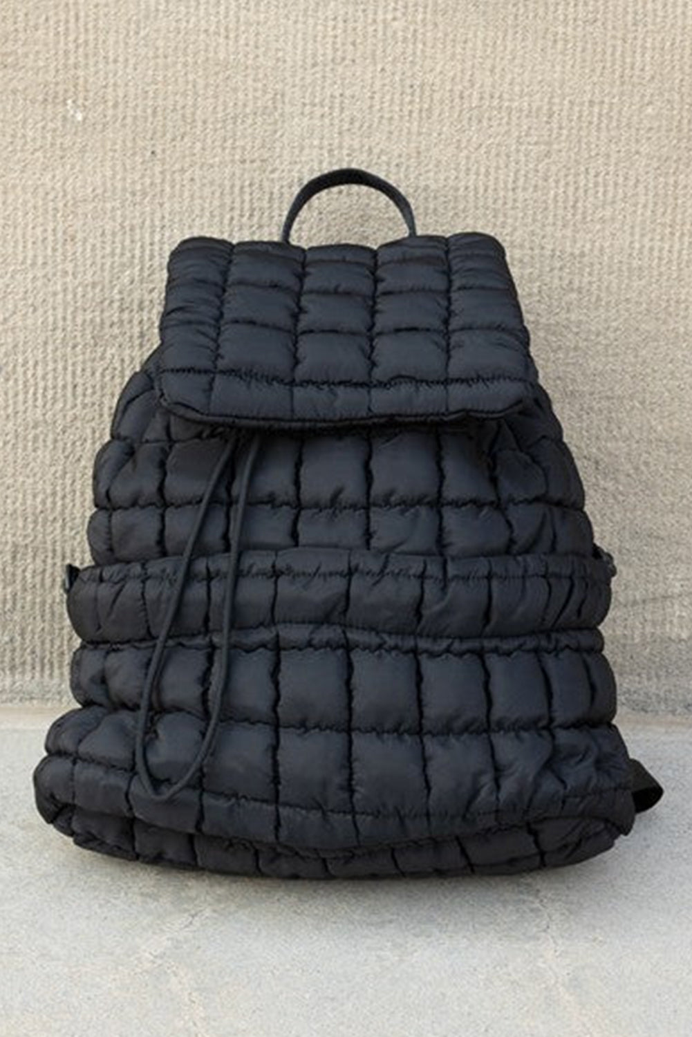 Dusk Blue Solid Flapped Quilted Puffer Backpack