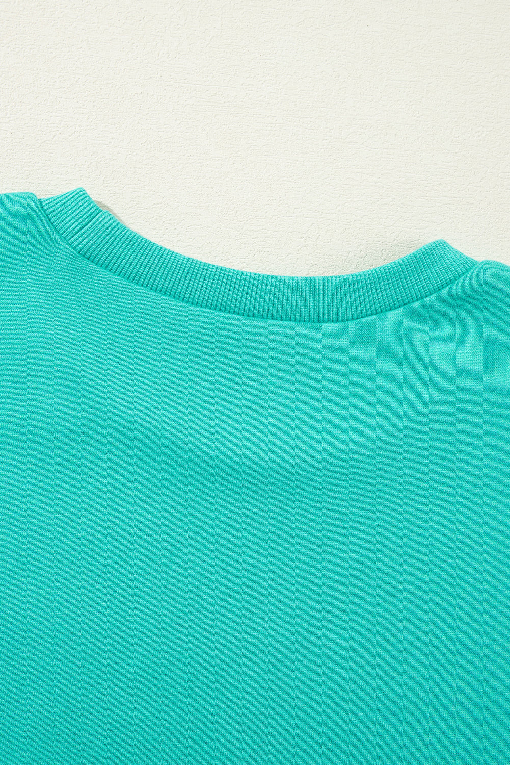 Parchment Solid O Neck High Low Hem Pullover Sweatshirt