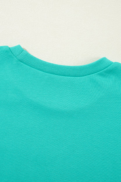 Parchment Solid O Neck High Low Hem Pullover Sweatshirt