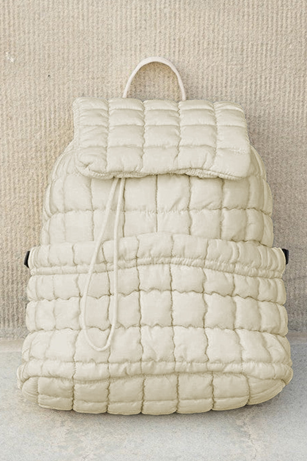 Dusk Blue Solid Flapped Quilted Puffer Backpack